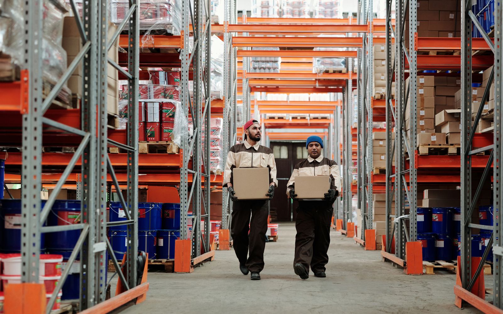 Two colleagues working together to organise stock